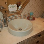 sink above counter tile backsplash