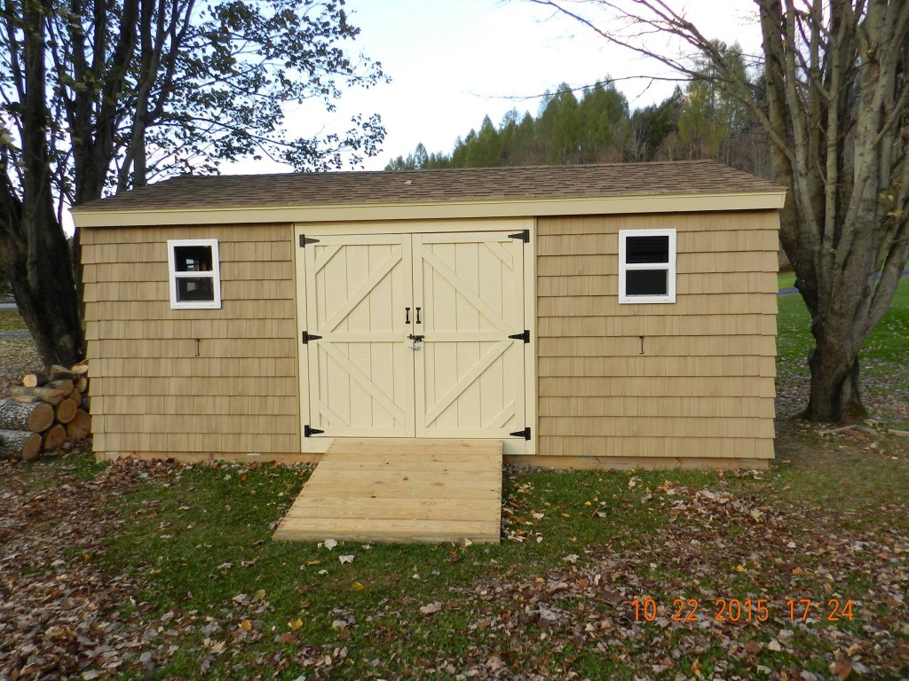 12x20 backyard shed with shake siding