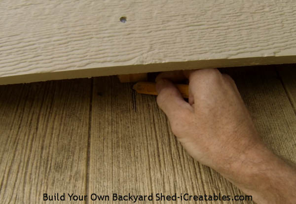 How to install exterior trim marking rafter locations on the soffit